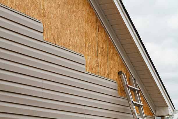 Professional Emergency Siding Repair technician working in Pine Level, NC